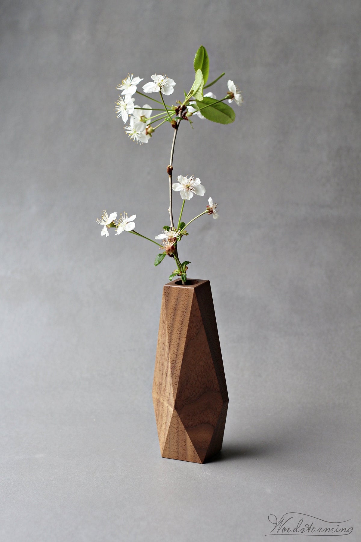 Faceted walnut wood vase for dried flowers and branches
