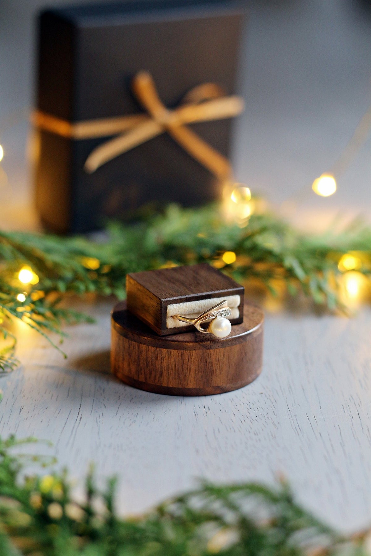 very small round wooden proposal ring box with pull out drawer